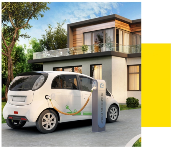 Elektroauto an Ladestation vor Haus